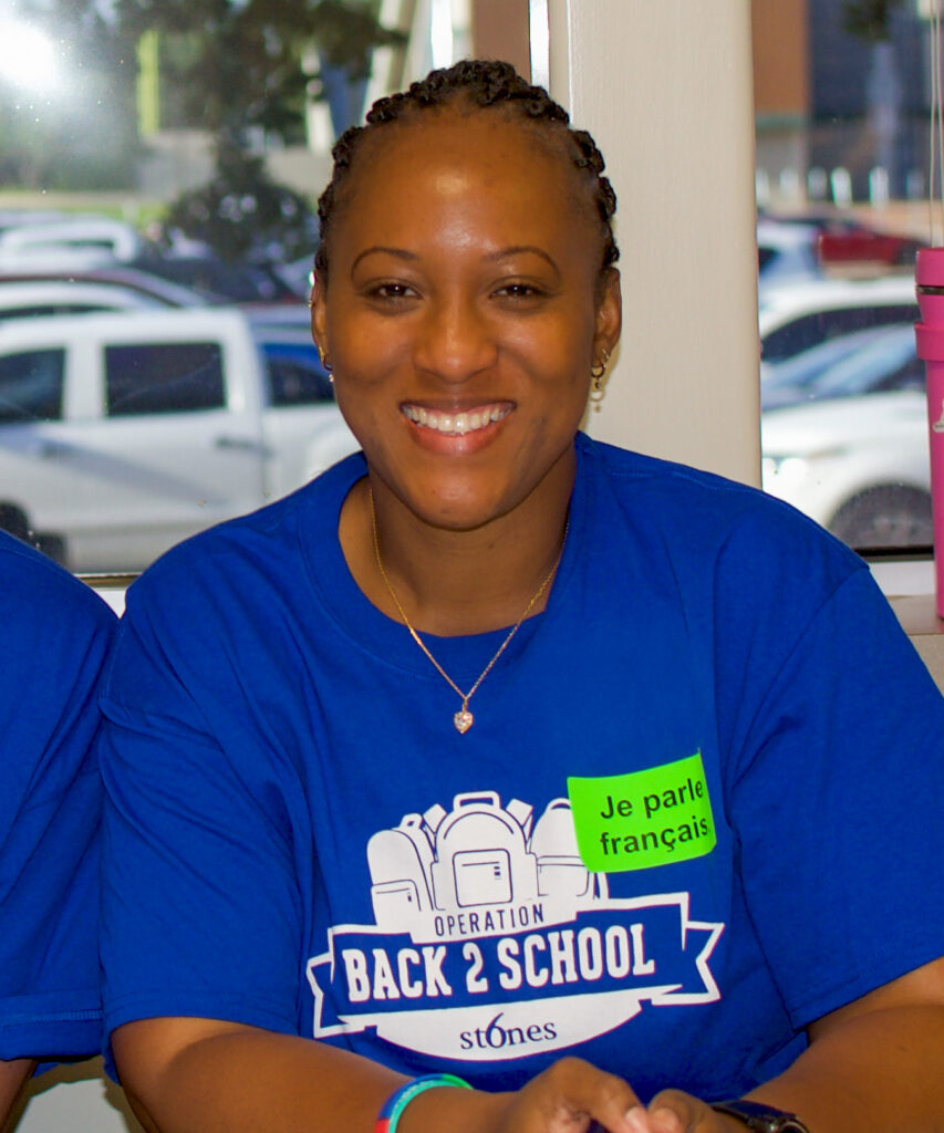 Operation Back 2 School volunteer wearing a French translator name tag.